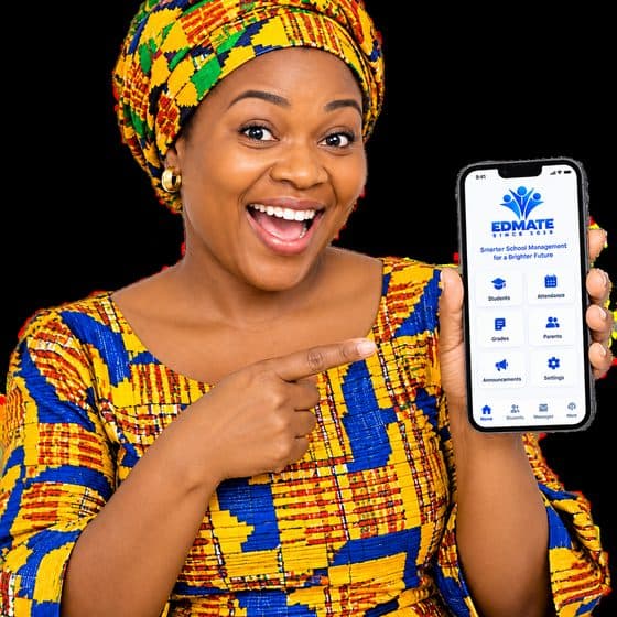 A mother in kente cloth smiling and holding up her phone